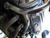 Grounded exhaust headers and engine bar
